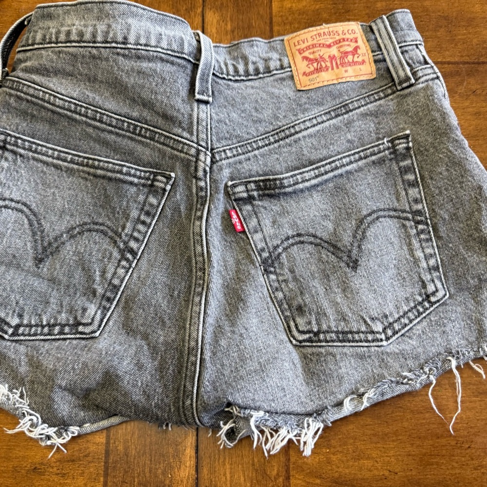 Levi's Black Wash Denim Cutoff Shorts with Frayed Hem size 25